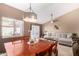 Bright open-concept living room with dining room and patio access at 945 N Pasadena -- # 62, Mesa, AZ 85201