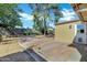 Open backyard space with a brick patio, a tree, and easy access to the residence at 9522 E Quarterline Rd, Mesa, AZ 85207