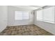 Bright bedroom featuring tiled floors, and a window air conditioning unit at 9522 E Quarterline Rd, Mesa, AZ 85207