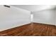 Spacious living room with hardwood flooring and neutral wall paint at 9522 E Quarterline Rd, Mesa, AZ 85207