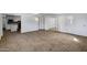 Open living area showcases tile floors and seamless transition to kitchen space at 9522 E Quarterline Rd, Mesa, AZ 85207