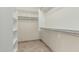 Walk-in closet offers built-in shelving and hanging rods for storage at 9550 E Thunderbird Rd # 149, Scottsdale, AZ 85260