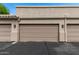 Exterior view of the neutral colored garage doors, providing secure parking at 9550 E Thunderbird Rd # 149, Scottsdale, AZ 85260