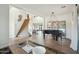 Grand foyer with staircase, tile flooring, piano and decor showcasing a bright, open living space at 9570 W Quail Track Dr, Peoria, AZ 85383