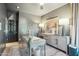 Well-lit office with a modern desk, stylish decor, and neutral walls at 9570 W Quail Track Dr, Peoria, AZ 85383