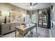 Charming home office with a modern desk, stylish decor, and great natural light at 9570 W Quail Track Dr, Peoria, AZ 85383