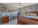 Bedroom featuring ceiling fan, natural light, writing desk, and wood furnishings at 9642 E Irwin Ave, Mesa, AZ 85209
