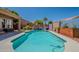 Backyard pool with lush landscaping, water feature and privacy create a tranquil retreat at 9642 E Irwin Ave, Mesa, AZ 85209
