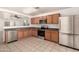 Bright eat-in kitchen featuring stainless steel appliances, tile floors and plenty of natural light at 9704 W Cordes Rd, Tolleson, AZ 85353