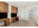 Office space with a desk and built in cabinets at 9704 W Cordes Rd, Tolleson, AZ 85353