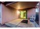 Covered patio with sliding door entry, and table with chairs at 9704 W Cordes Rd, Tolleson, AZ 85353