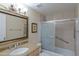 Bright bathroom with granite countertops and shower-tub combo at 9711 E Mountain View Rd # 2543, Scottsdale, AZ 85258