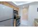 Well-equipped kitchen featuring stainless steel appliances and ample cabinet space at 9711 E Mountain View Rd # 2543, Scottsdale, AZ 85258