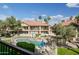Lovely community pool and hot tub with lounge chairs and well-maintained landscaping at 9711 E Mountain View Rd # 2543, Scottsdale, AZ 85258