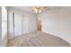 Bright bedroom with neutral carpet, a ceiling fan, and a closet at 16036 N 11Th Ave # 1084, Phoenix, AZ 85023