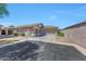 Well-maintained home featuring stone accents, a two-car garage, and mature landscaping at 16036 N 11Th Ave # 1084, Phoenix, AZ 85023