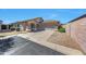 Attractive home with a two-car garage, stone accents, a tile roof and low-maintenance landscaping at 16036 N 11Th Ave # 1084, Phoenix, AZ 85023