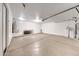 Spacious two car garage with white walls, concrete flooring, and ample storage at 16036 N 11Th Ave # 1084, Phoenix, AZ 85023