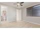 Bedroom showcasing hardwood floors, fan, and access to an attached bathroom at 1779 E Kaibab Dr, Chandler, AZ 85249