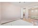 Bedroom displaying hardwood floors, a custom bed frame, and a mirrored closet at 1779 E Kaibab Dr, Chandler, AZ 85249