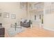 Expansive living room with hardwood floors, high ceilings, and a balcony overlook at 1779 E Kaibab Dr, Chandler, AZ 85249