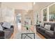 Bright living room features an open floor plan, high ceilings, and hardwood floors at 1779 E Kaibab Dr, Chandler, AZ 85249