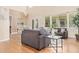 Open-concept living room with hardwood floors, high ceilings and tons of natural light at 1779 E Kaibab Dr, Chandler, AZ 85249