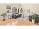 Bright living room features hardwood floors, neutral walls and large windows at 1779 E Kaibab Dr, Chandler, AZ 85249