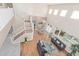 Open floor plan with staircase, dining area, and living room furniture with plenty of natural light at 1779 E Kaibab Dr, Chandler, AZ 85249
