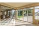 Bright sun room with tile floors, large windows overlooking the back yard and swimming pool at 1779 E Kaibab Dr, Chandler, AZ 85249