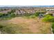 Aerial view of a residential community featuring a large grassy field for recreation at 4615 E Calistoga Dr, Gilbert, AZ 85297