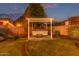 Private backyard oasis featuring a hot tub, pergola, and manicured landscaping at 4615 E Calistoga Dr, Gilbert, AZ 85297
