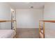 Bright bedroom featuring carpet floors and wood bunkbeds, perfect for children or guests at 4615 E Calistoga Dr, Gilbert, AZ 85297