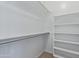 Walk-in closet with built-in shelving, and carpeted floor at 4615 E Calistoga Dr, Gilbert, AZ 85297
