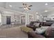 Open concept living room showcasing natural light and wood flooring at 4615 E Calistoga Dr, Gilbert, AZ 85297