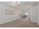 Bright living room with carpeted floors and neutral decor at 4615 E Calistoga Dr, Gilbert, AZ 85297