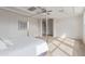Main bedroom showcasing natural light, modern fixtures, and neutral carpeting at 4615 E Calistoga Dr, Gilbert, AZ 85297