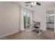 Home office featuring a standing desk with a sliding glass door and lots of natural light at 4615 E Calistoga Dr, Gilbert, AZ 85297