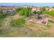 Overhead view of a playground with play equipment and benches surrounded by trees and greenery at 4615 E Calistoga Dr, Gilbert, AZ 85297