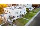 Aerial view showing the unit's private patio, well-maintained lawn and street parking at 5243 N 42Nd Ln, Phoenix, AZ 85019