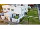 Aerial view showing the unit's private patio, well-maintained lawn, and proximity to community parking at 5243 N 42Nd Ln, Phoenix, AZ 85019