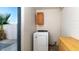 This laundry room features a modern washing machine and ample storage space for laundry essentials at 5243 N 42Nd Ln, Phoenix, AZ 85019