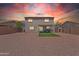 Spacious backyard featuring a patio and artificial turf, ideal for entertaining or relaxing at 10417 W Pioneer St, Tolleson, AZ 85353