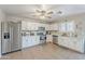 Bright, well-equipped kitchen with stainless steel appliances and ample counter space at 10417 W Pioneer St, Tolleson, AZ 85353