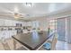 Inviting kitchen featuring white cabinetry, stainless appliances, and a large center island at 10417 W Pioneer St, Tolleson, AZ 85353