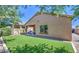 Charming backyard with lush artificial turf, covered patio and privacy, perfect for outdoor entertaining at 11060 E Sorpresa Ave, Mesa, AZ 85212