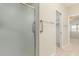 Bathroom with shower, and views to bedroom and walk-in closet at 11250 E Kilarea Ave # 276, Mesa, AZ 85209