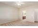 Bright bedroom with ensuite bathroom featuring neutral carpet and access to bath at 11250 E Kilarea Ave # 276, Mesa, AZ 85209