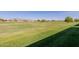 Beautiful views of the community green space with mountains in the distance at 11250 E Kilarea Ave # 276, Mesa, AZ 85209