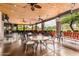 Covered outdoor patio featuring comfortable seating and scenic views of the surrounding community at 11250 E Kilarea Ave # 276, Mesa, AZ 85209